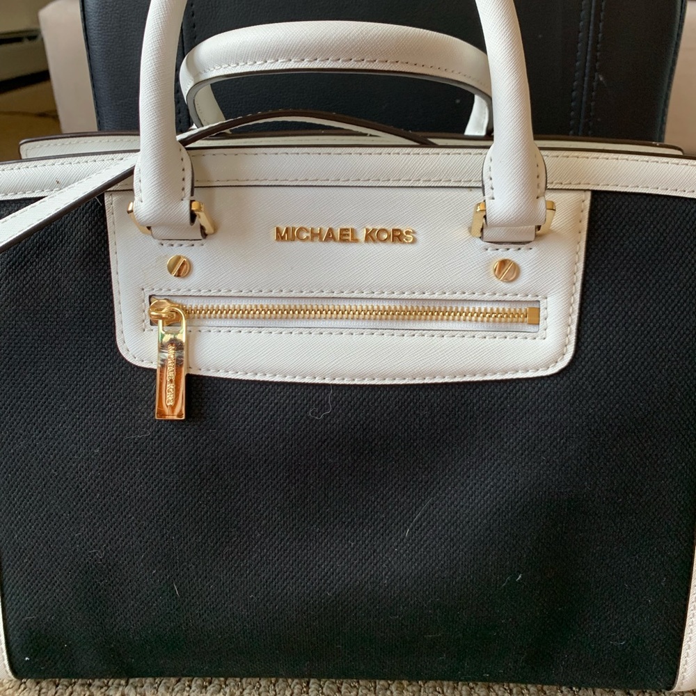 Black and white Michael Kors purse